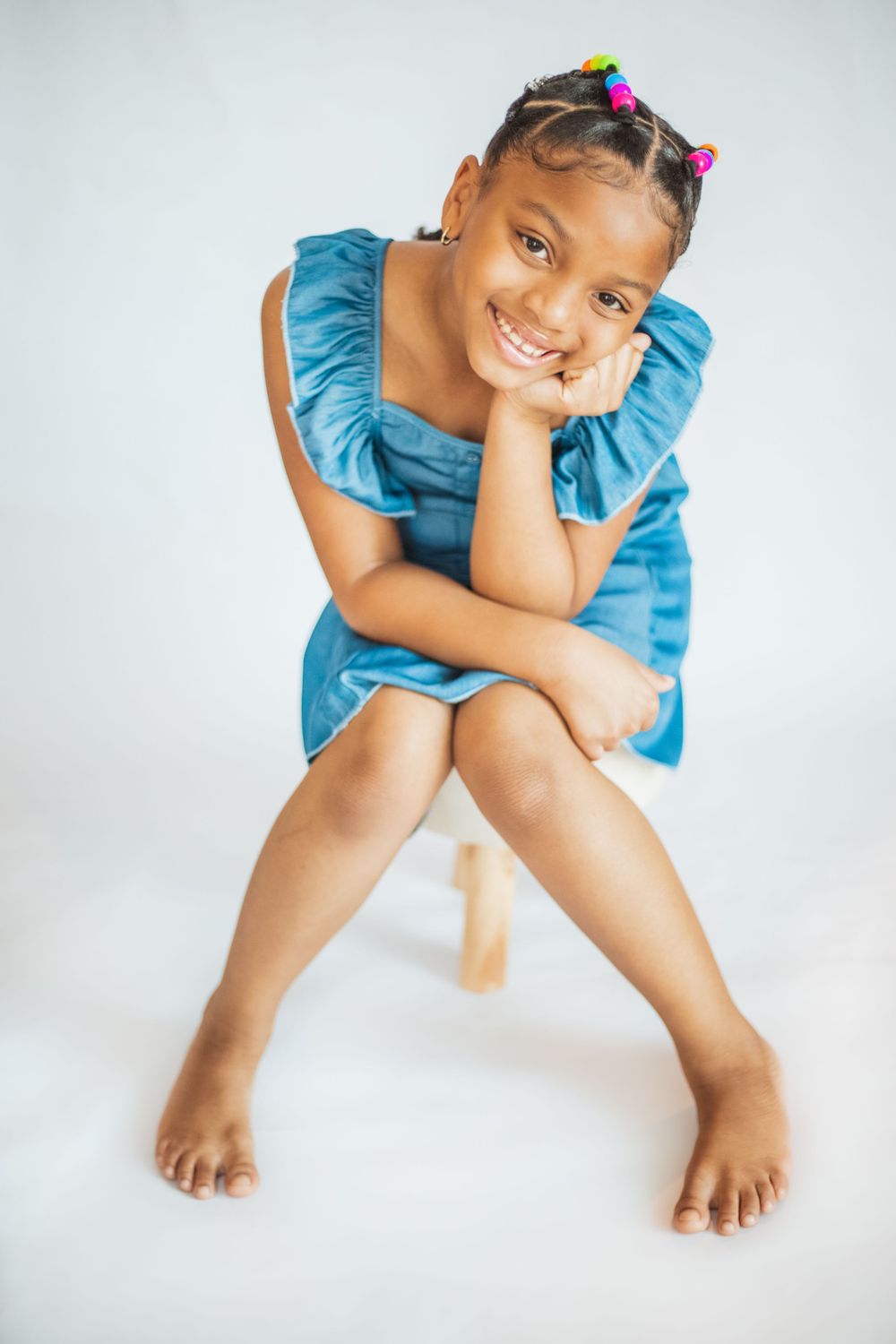 Young girl indoor photoshoot in a studio.
