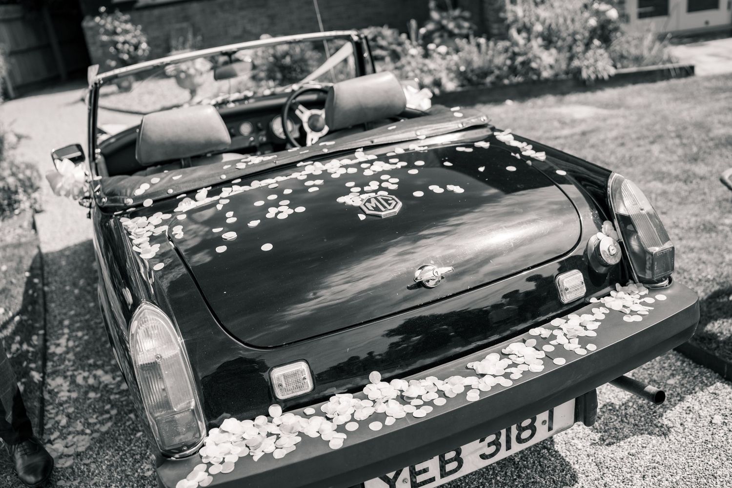 SUFFOLK WEDDING PHOTOGRAPHY - MARQUEE GARDEN WEDDING SUFFOLK - EDITORIAL WEDDING PHOTOGRAPHY VINTAGE CAR CONFETTI SHOT