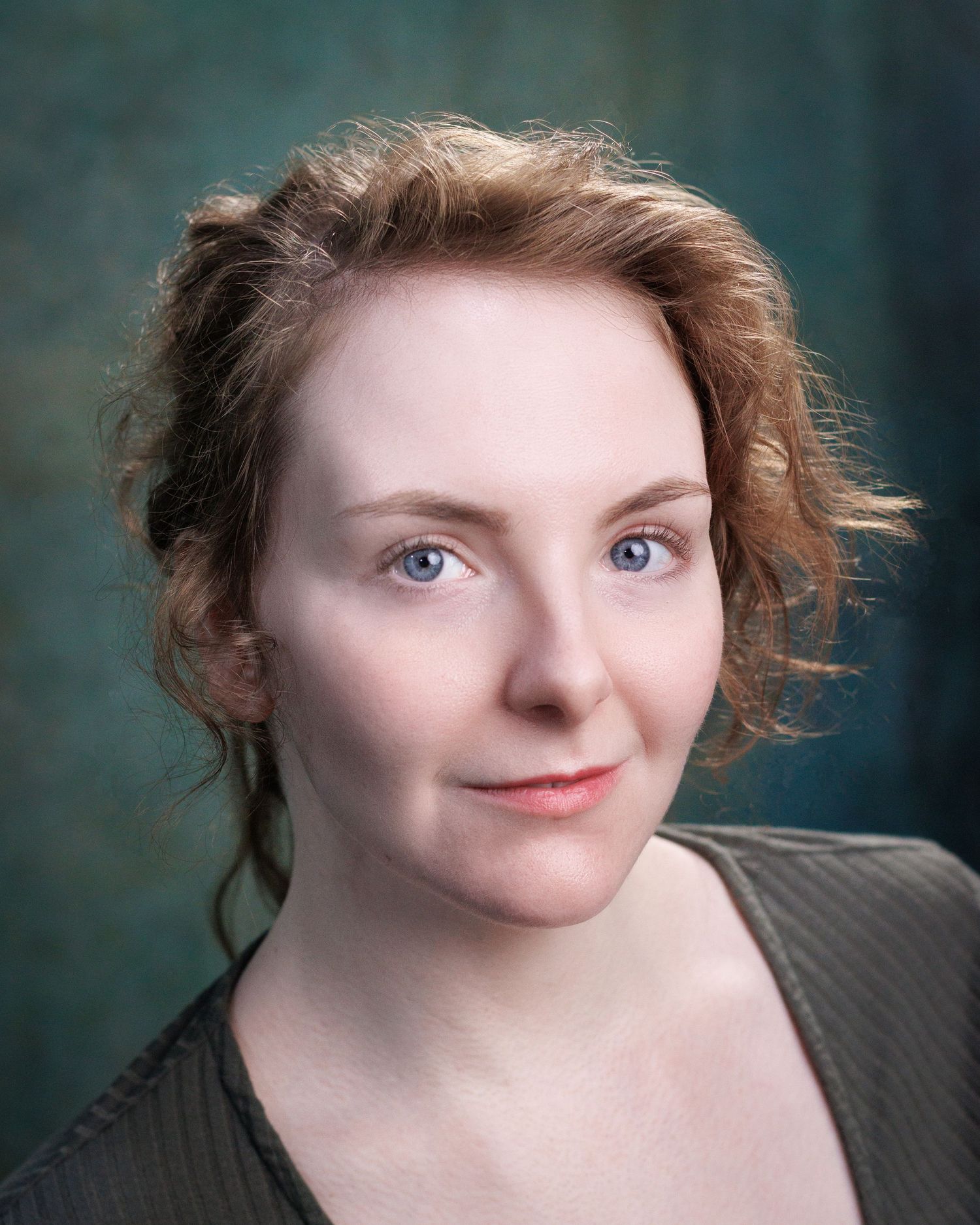A sequence of portrait shots with gradually increasing closeups against a muted teal background.