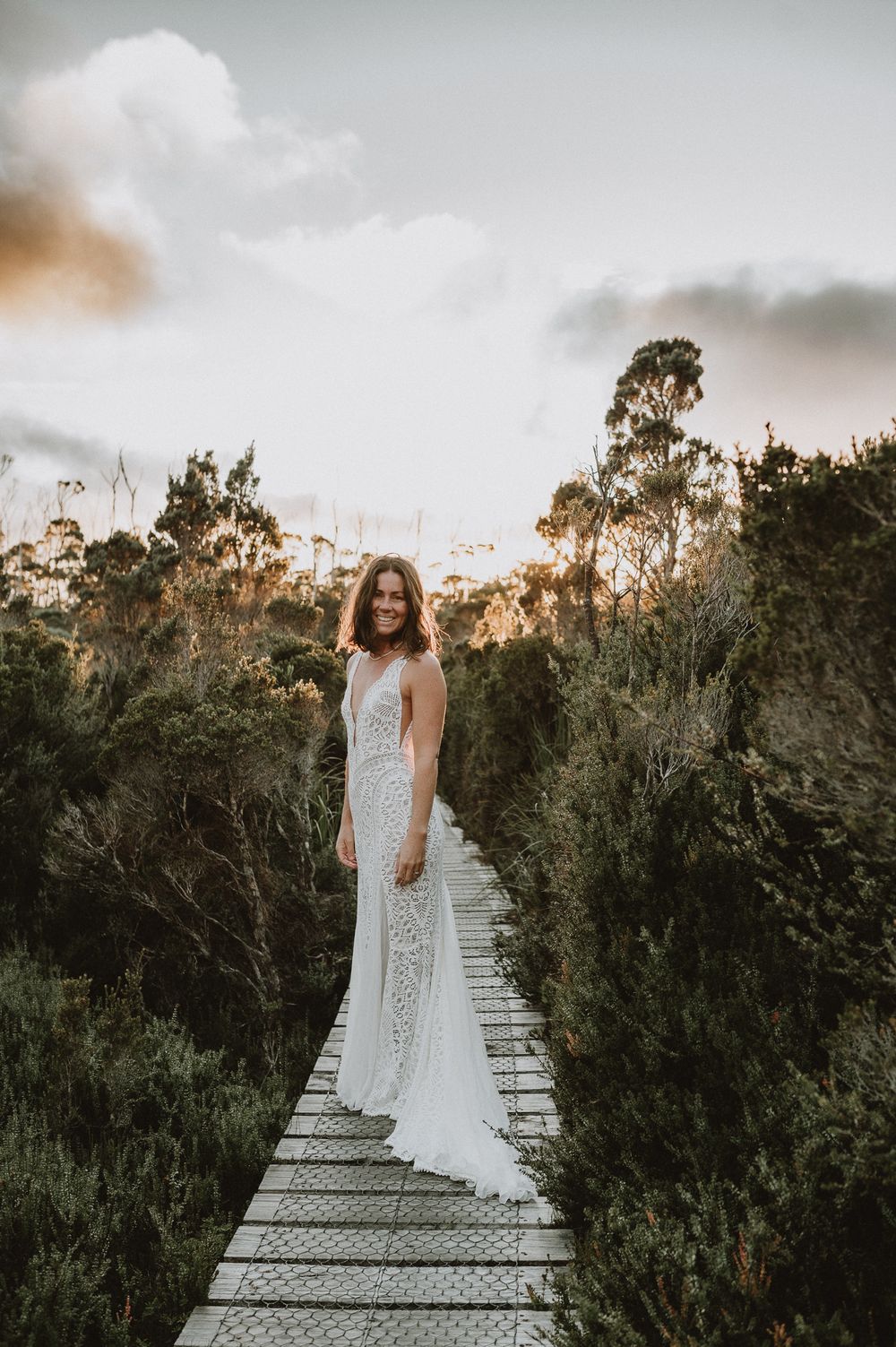 A beautiful sunrise elopement at Lake Osborne in Hartz Mountain National Park, Tasmania. Taken by world renowned photographer Joss Jensen