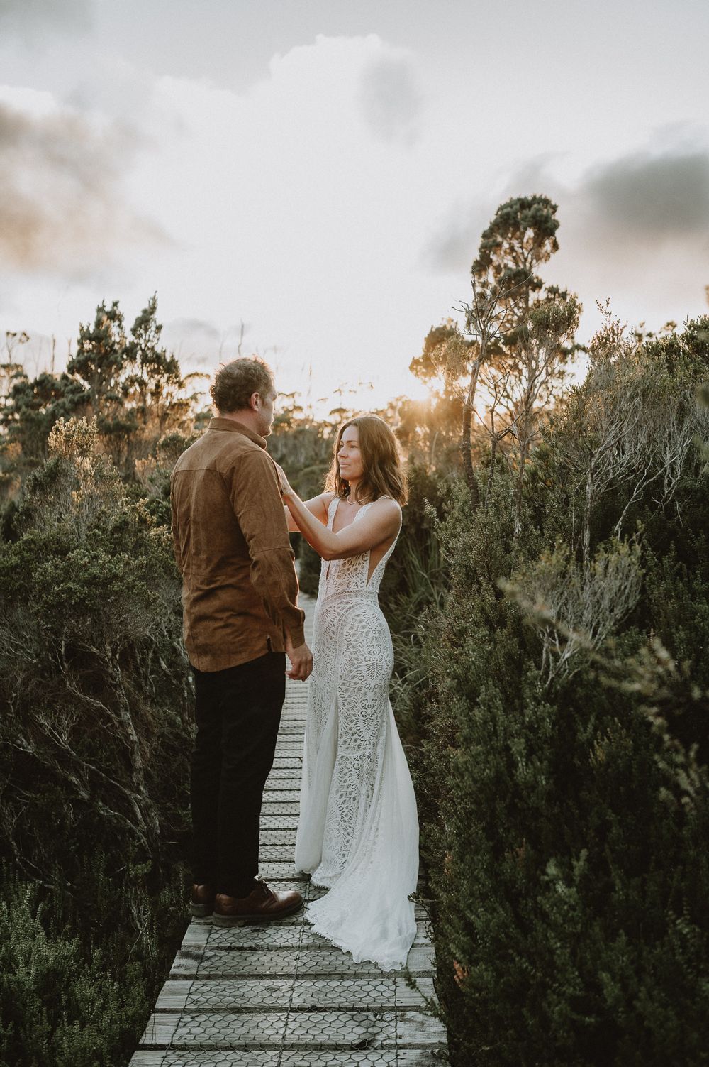 A beautiful sunrise elopement at Lake Osborne in Hartz Mountain National Park, Tasmania. Taken by world renowned photographer Joss Jensen