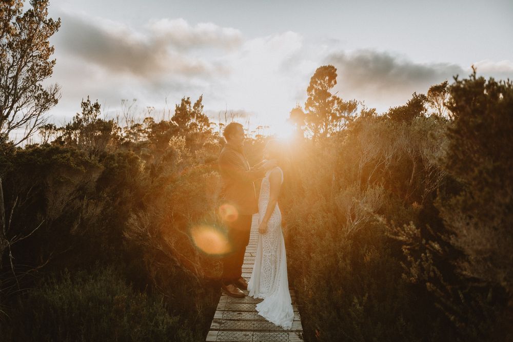 A beautiful sunrise elopement at Lake Osborne in Hartz Mountain National Park, Tasmania. Taken by world renowned photographer Joss Jensen