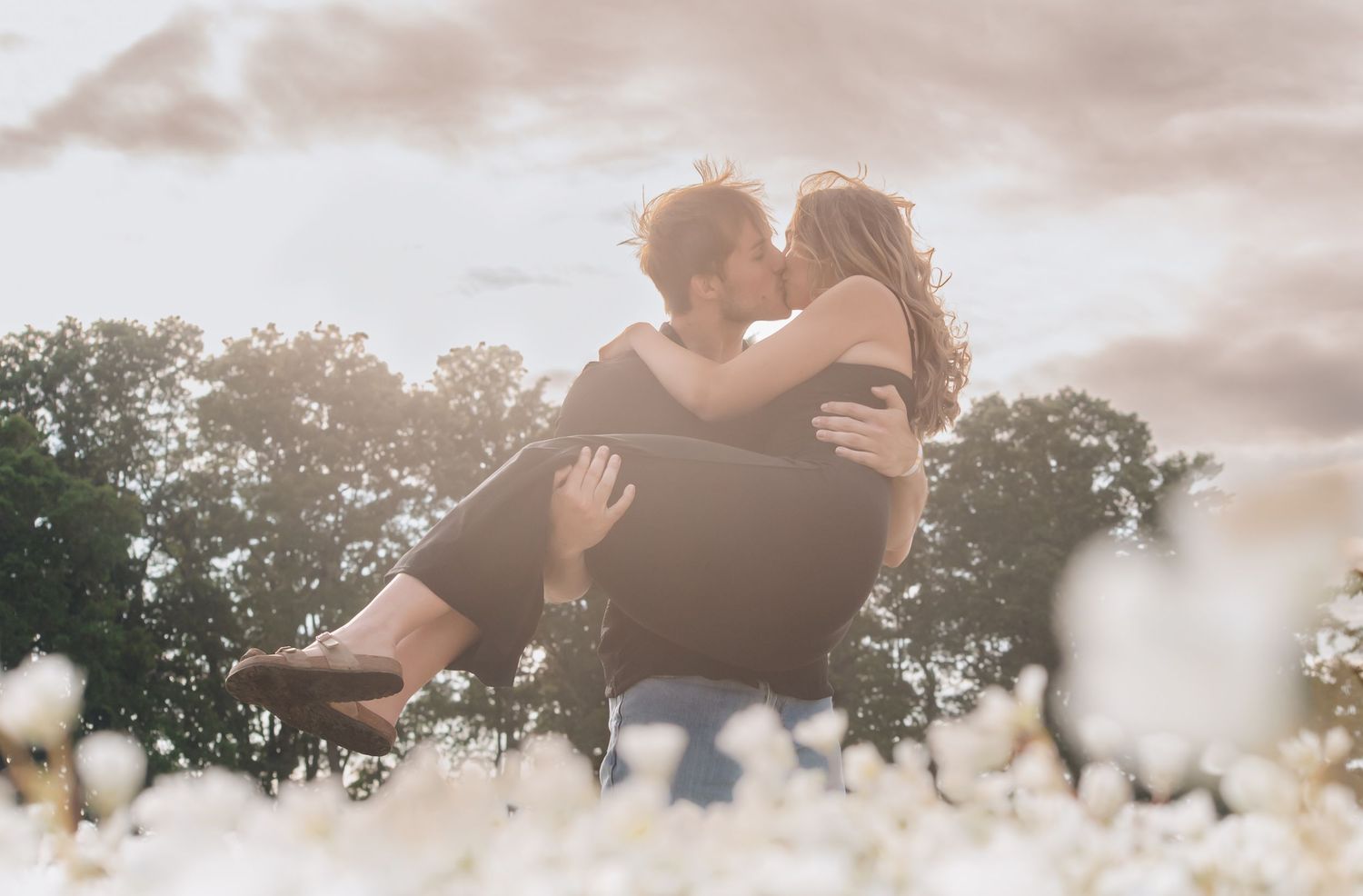 The dramatic background lighting the two lovers up.
