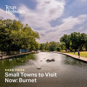 Scenic Texas waterway with trees lining the banks and cloudy skies reflecting on calm water.