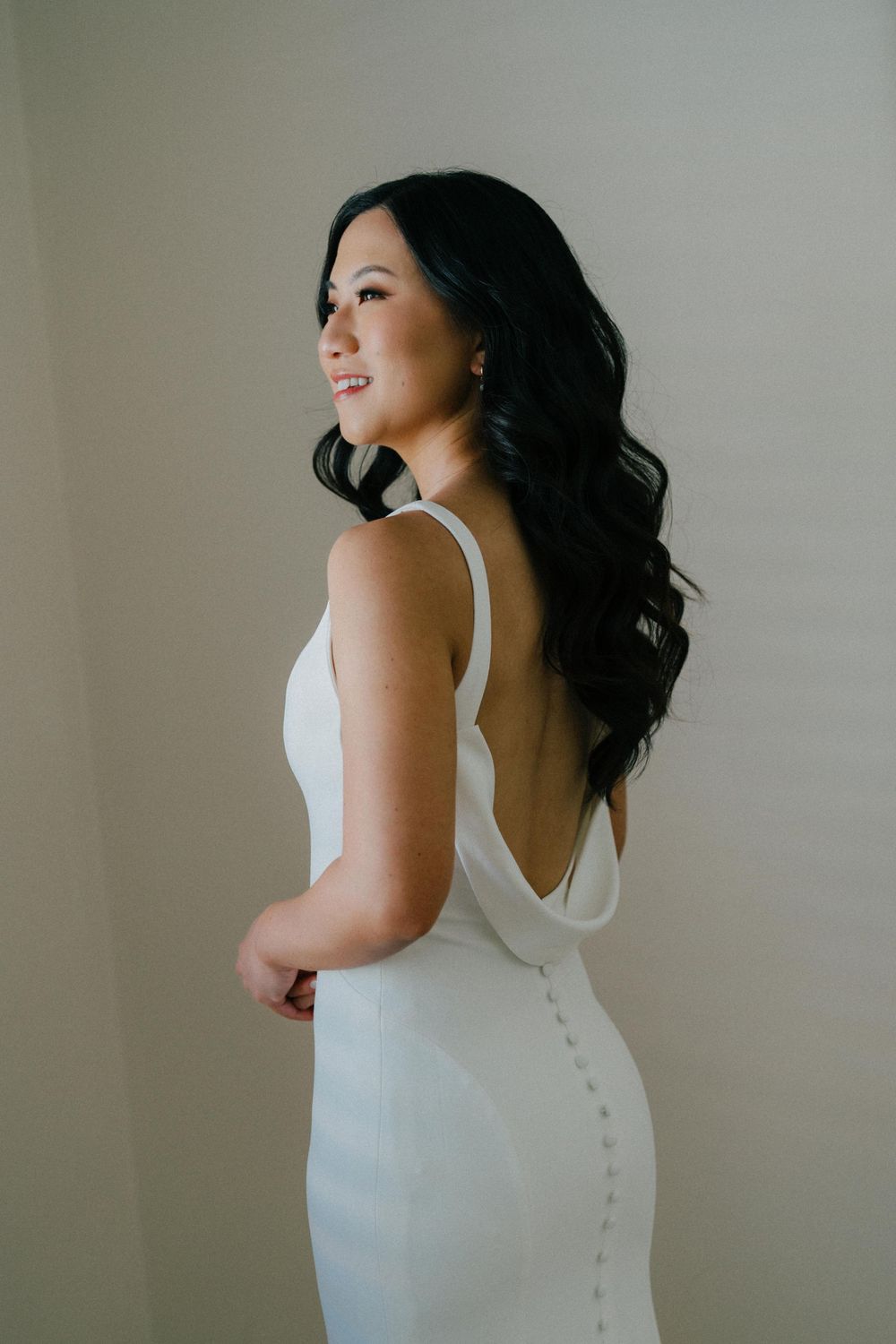 Bride’s final moments before the ceremony at The Refinery, captured in a candid, emotional style.”