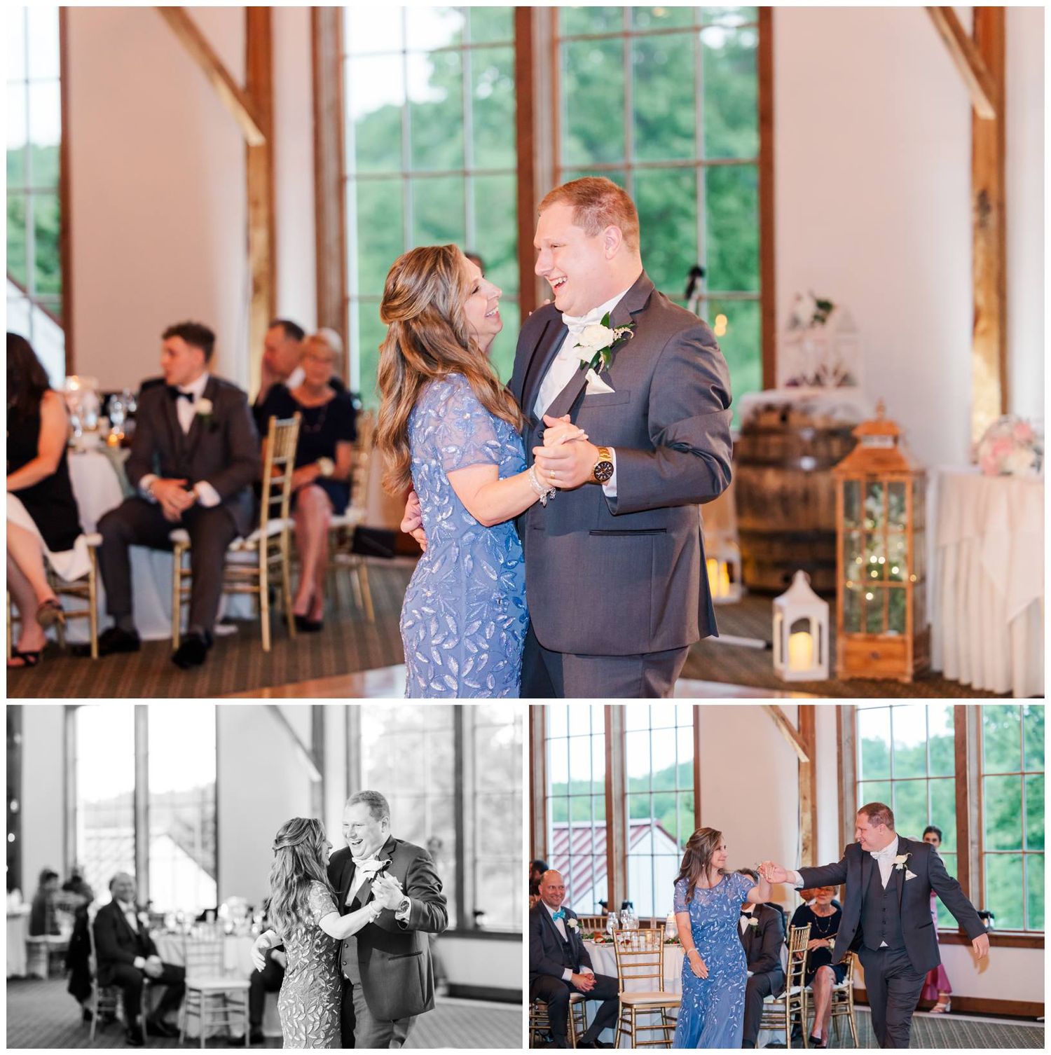 Wedding guests dance together during a reception at an elegant venue with large windows overlooking green trees outside.