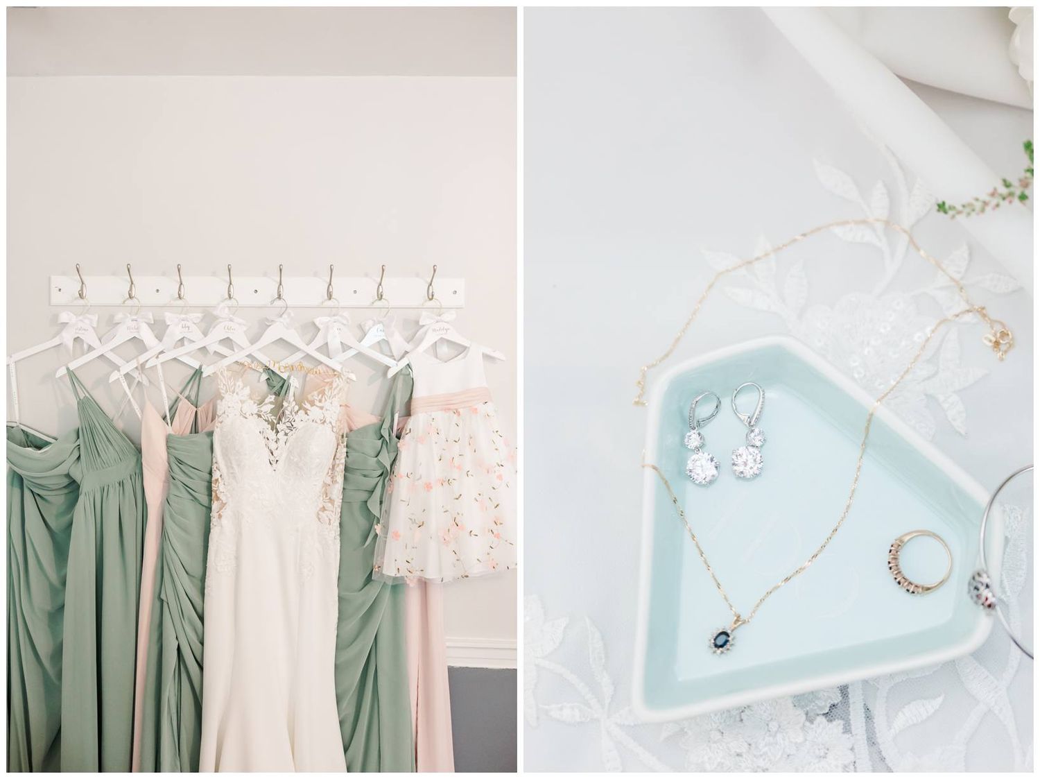 Soft sage green bridesmaid dresses hanging alongside an ivory wedding gown next to jewelry on a pale blue trinket dish.