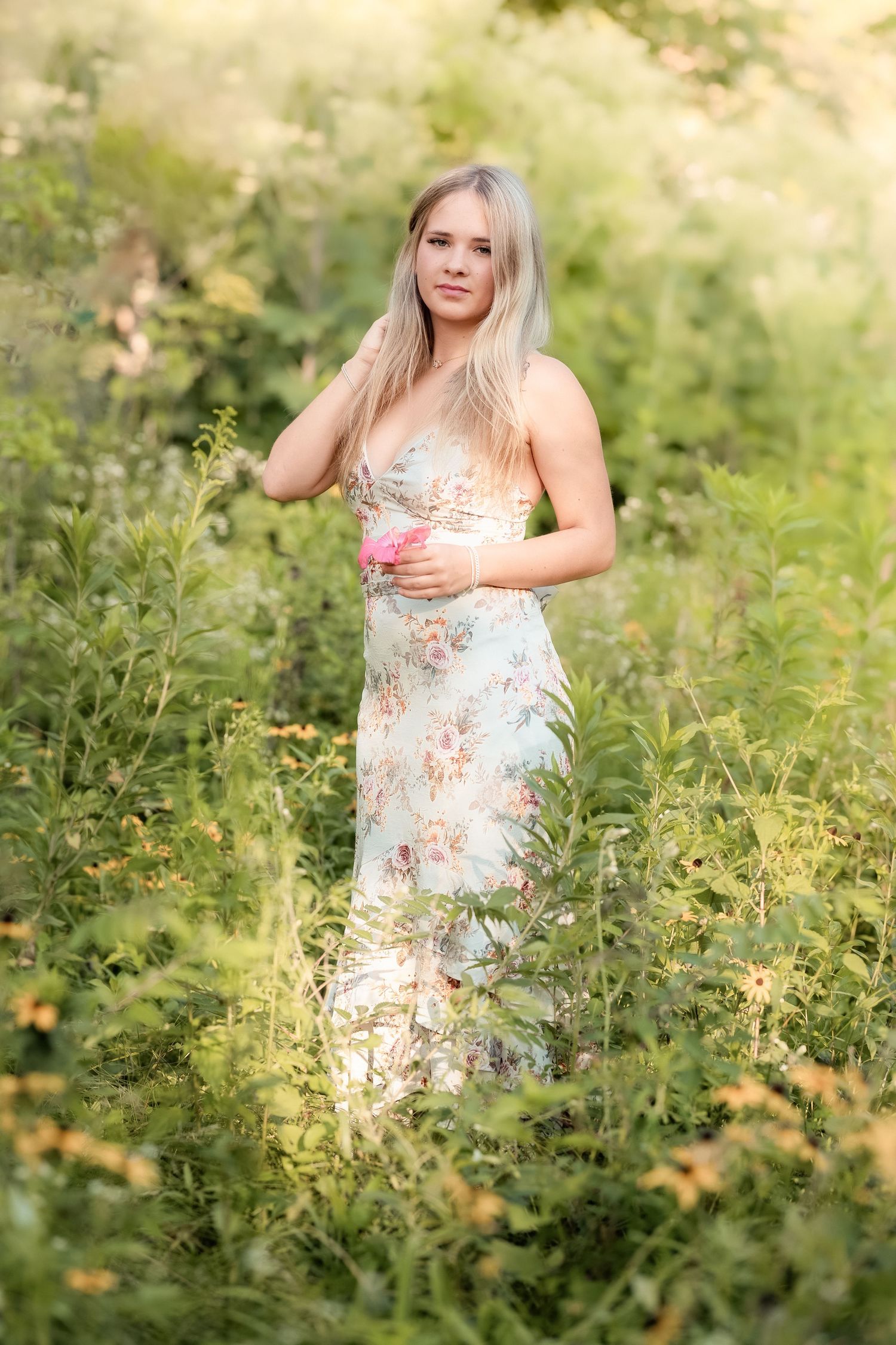 Minnesota Senior photo in a field at golden hour white dress mn senior photographer