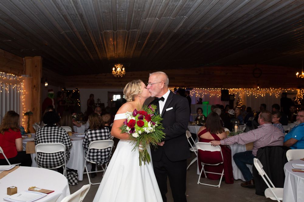 Bride and groom sharing a joyful moment during their wedding day in North Carolina.