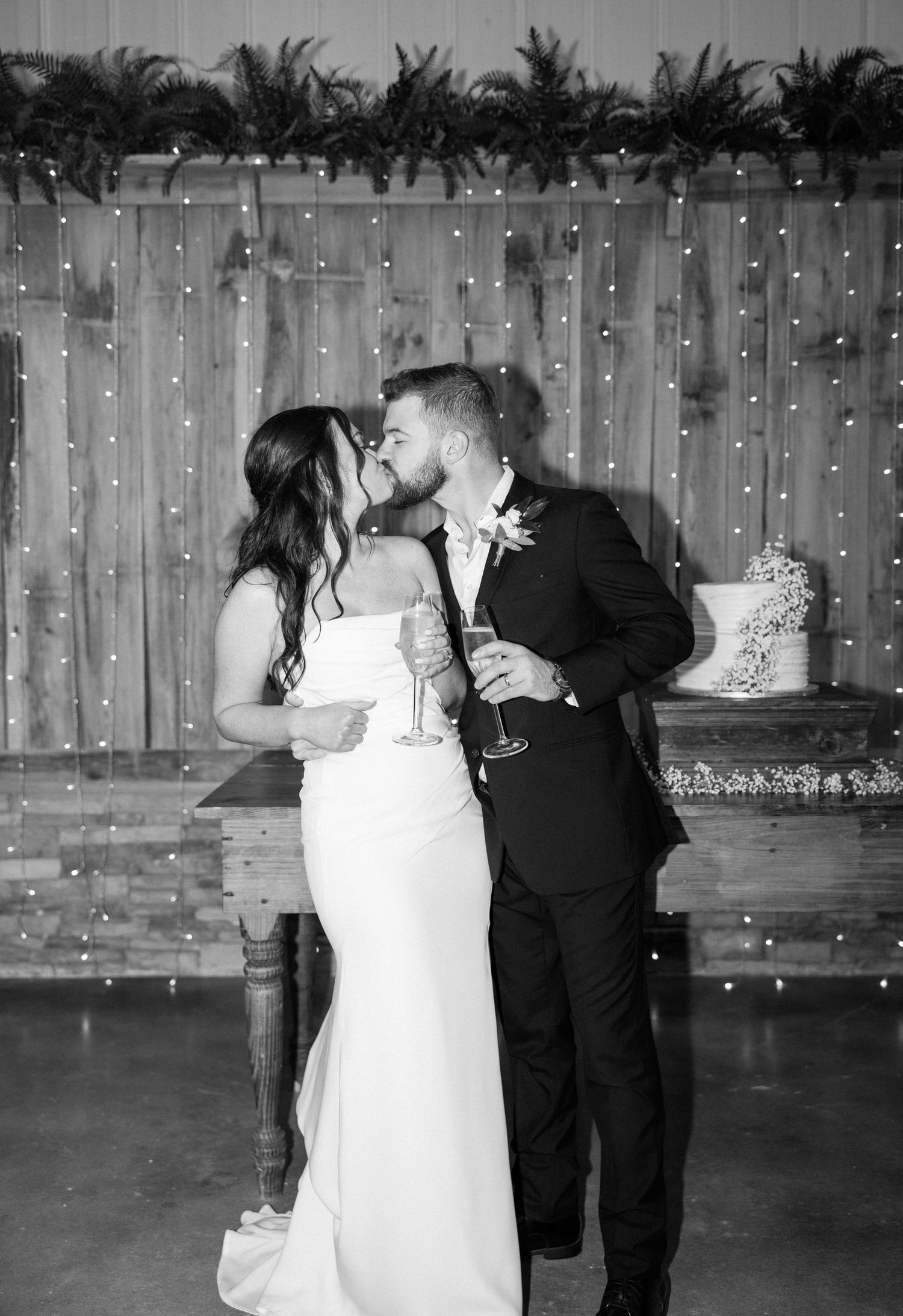 Romantic black and white wedding dance sequence showing four progressive moments of a couple's first dance.