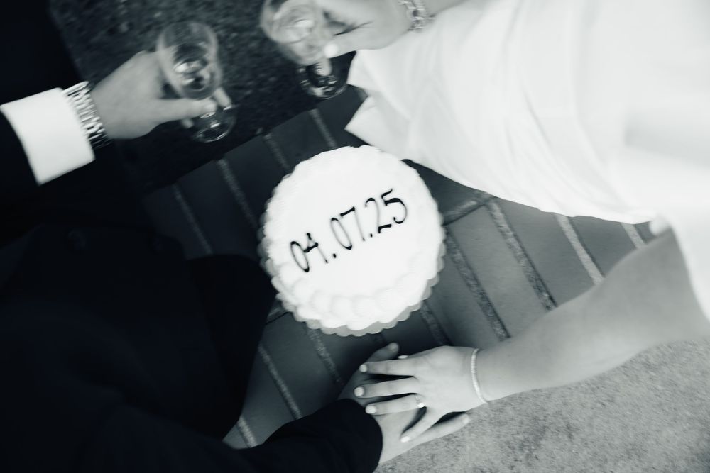 Vintage trendy couples session with handwritten numbers and text on white labels against a dark background.