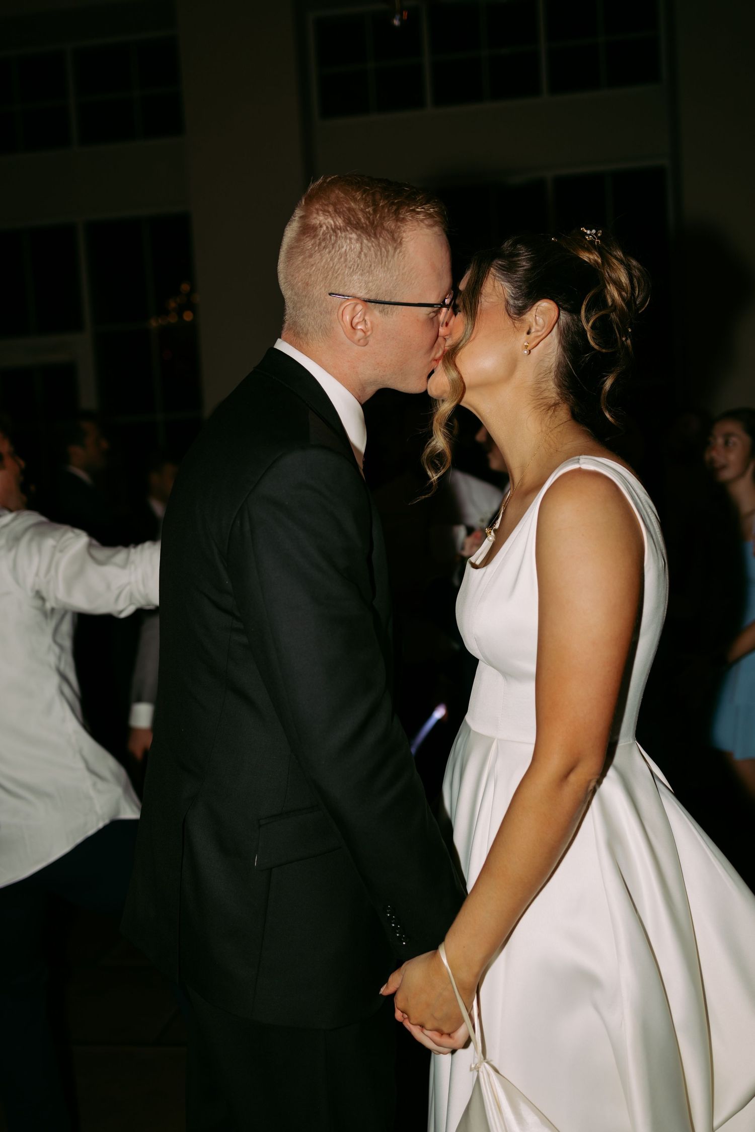 Romantic wedding dance capture of a couple sharing an intimate moment on the dance floor.