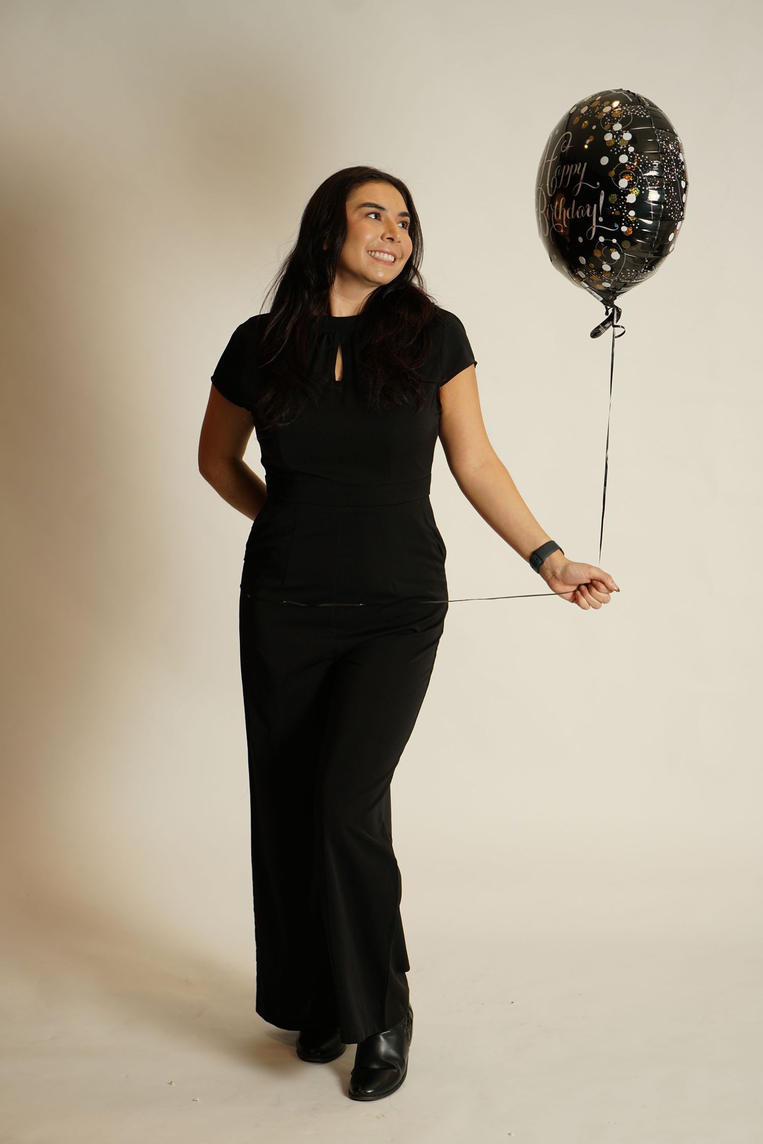 Birthday photoshoot in an indoor studio.