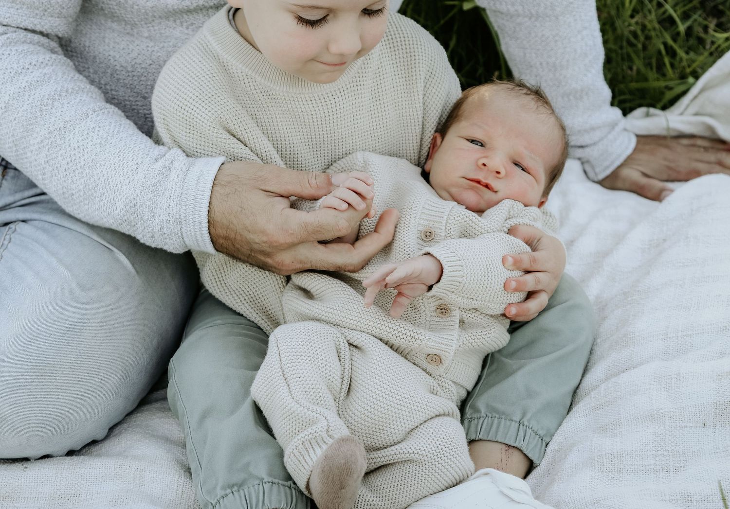 Dad's hands with his sons