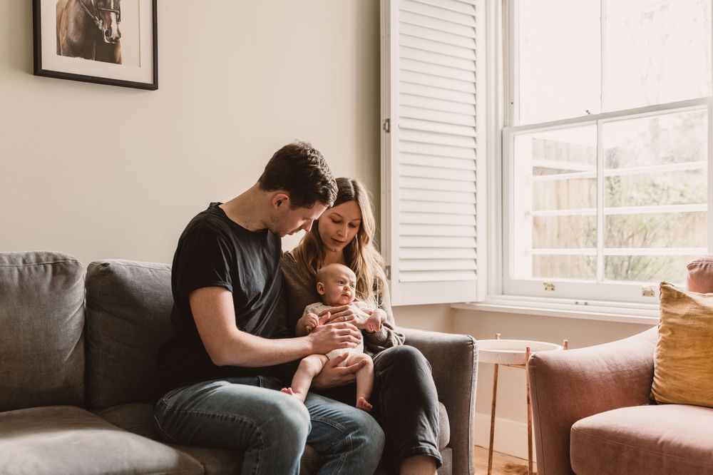 13-week-old baby boy and his parents at an in-home newborn session in London.