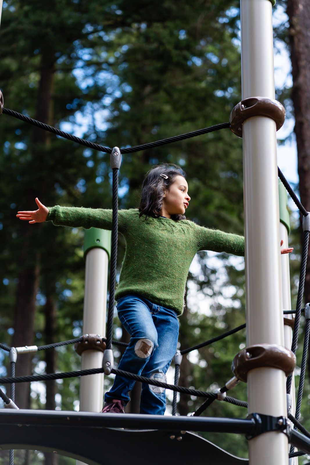Child playing on playground at Lincoln Park.