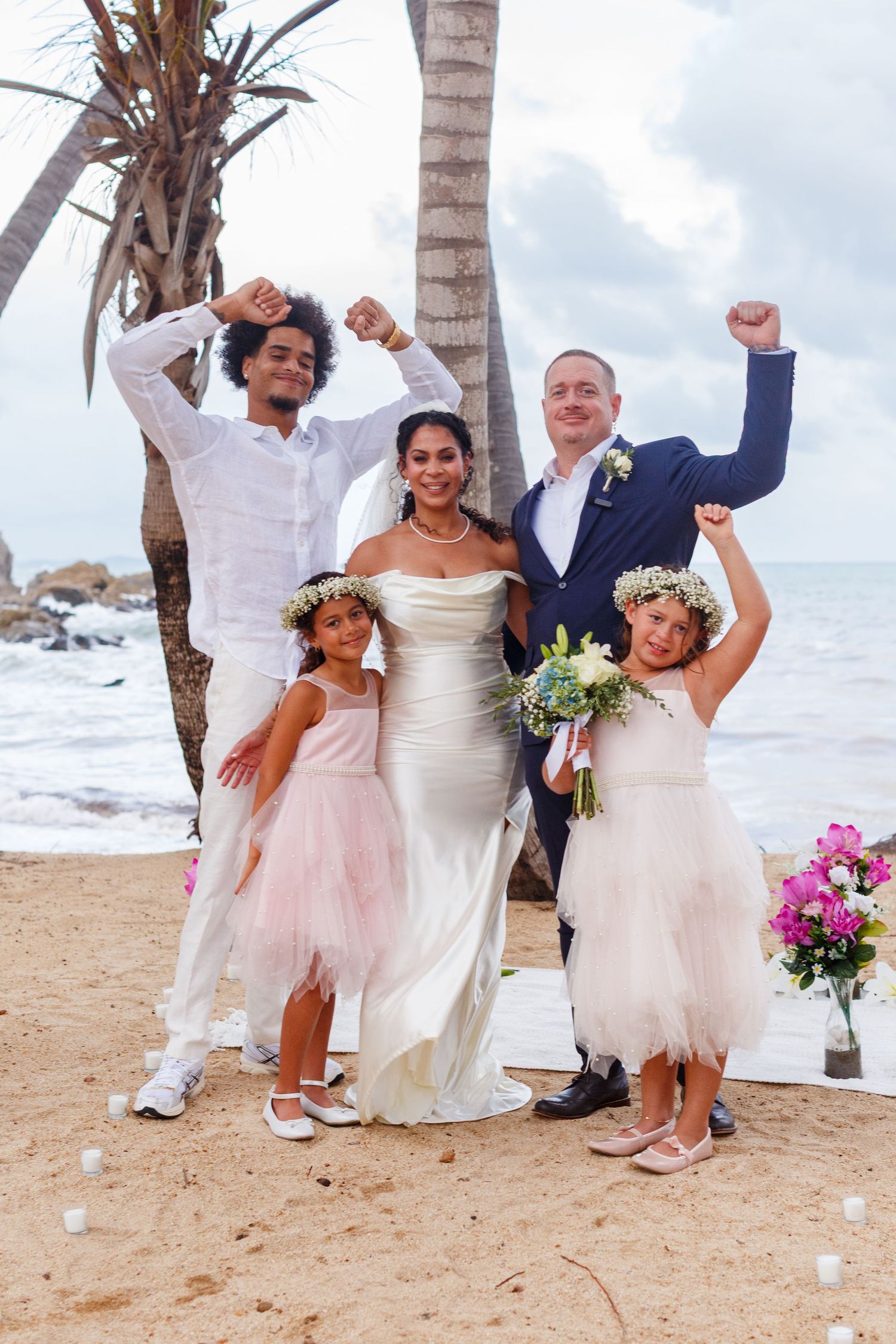 Family portrait. Intimate beach wedding in Palmas del Mar, Puerto Rico.