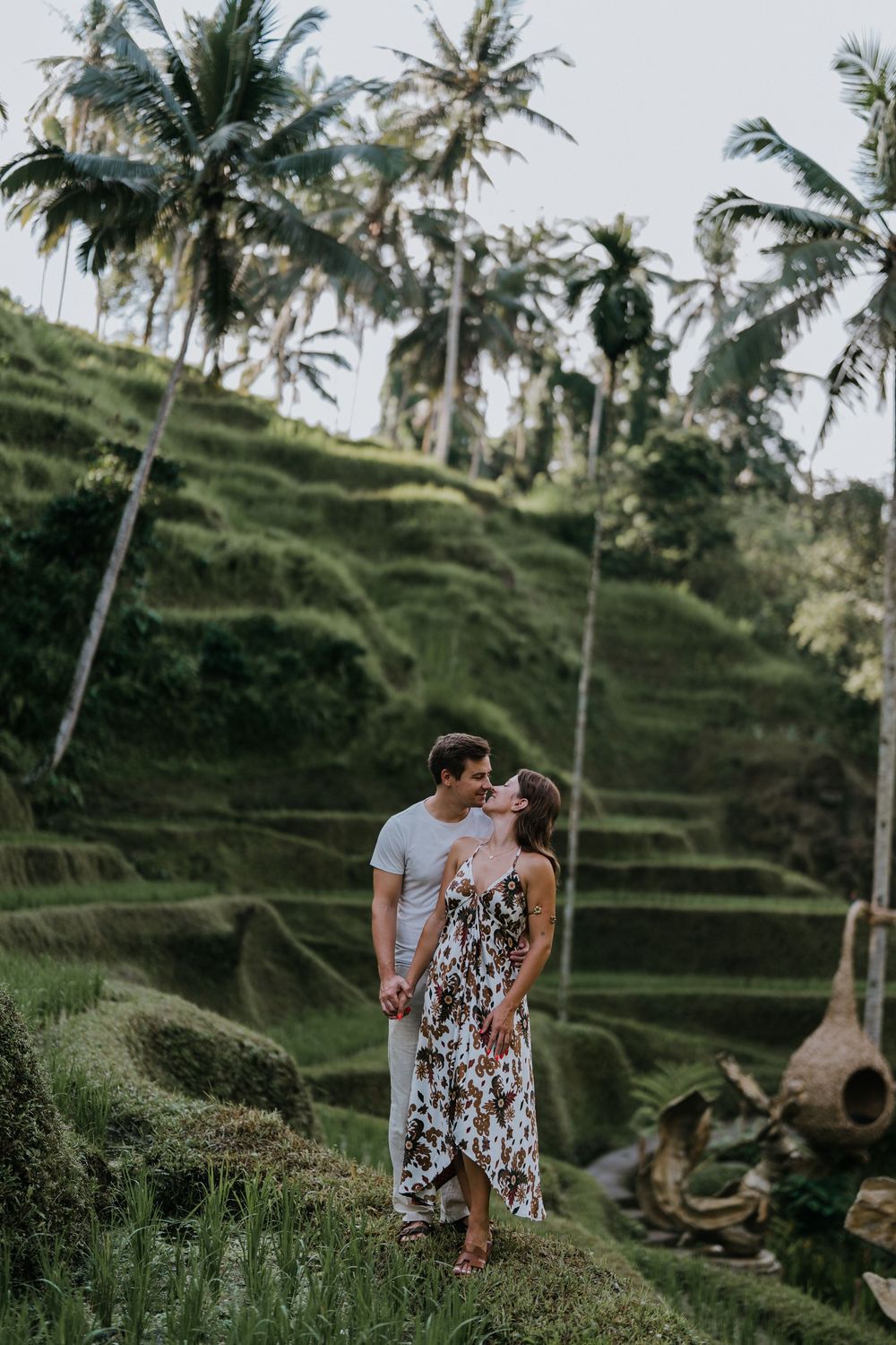 Bali couple photoshoot with ricefield and waterfall background