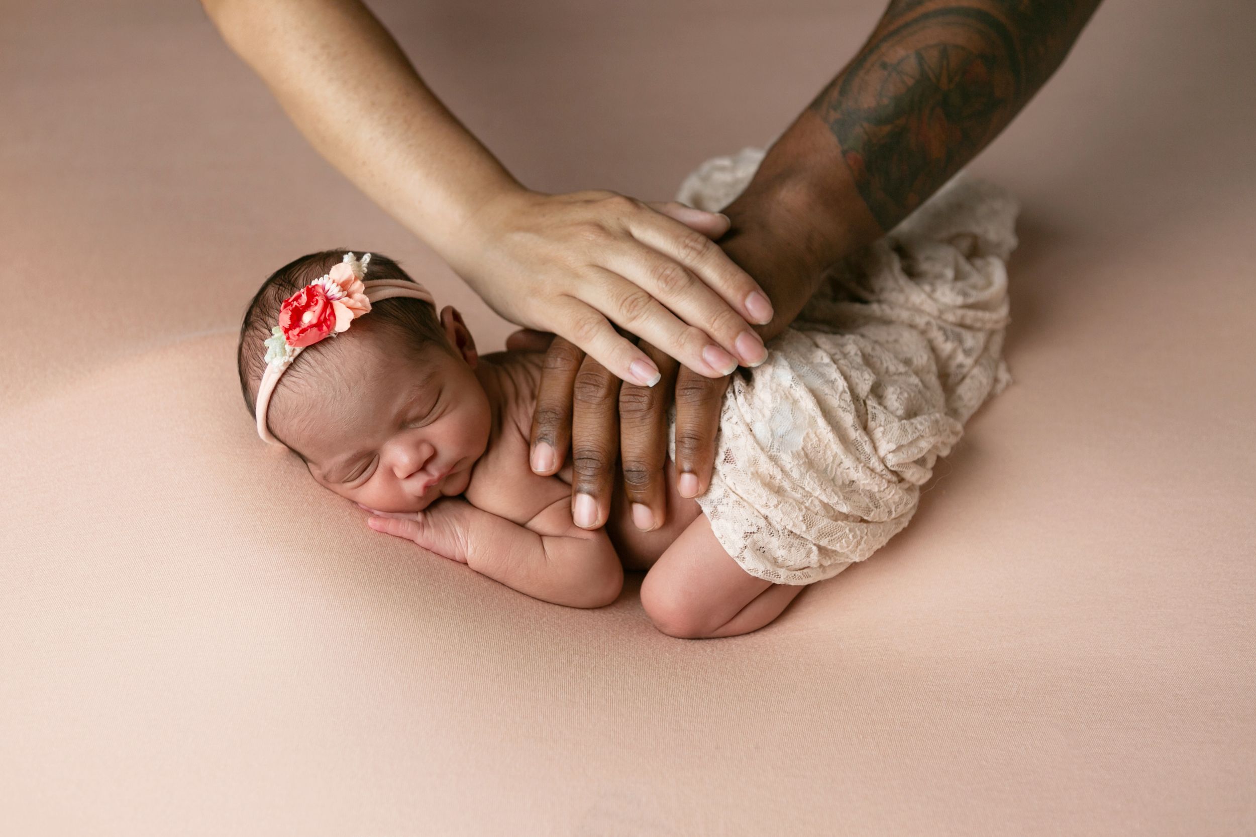 Gentle hands cradle a sleeping newborn, Orlando Newborn Photography, Sanford Newborn Photography, Newborn Photos, Newborn Photo Studio