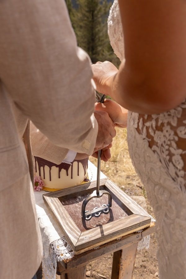 Hands pouring dark chocolate glaze over a cake on a wooden board in a step-by-step sequence.