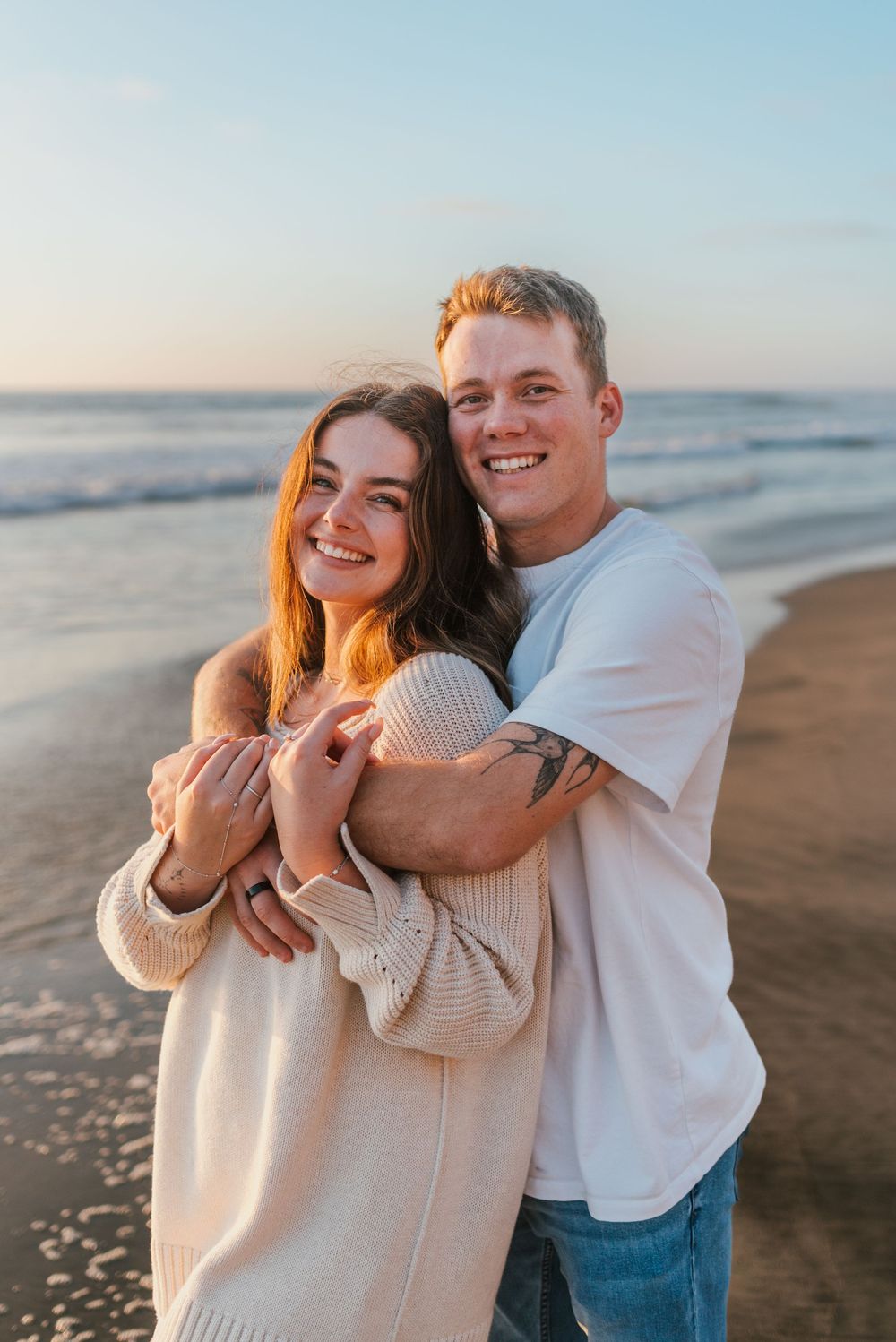 Blacks Beach couples photos with candid movement and dramatic coastal views, San Diego Engagement Photos