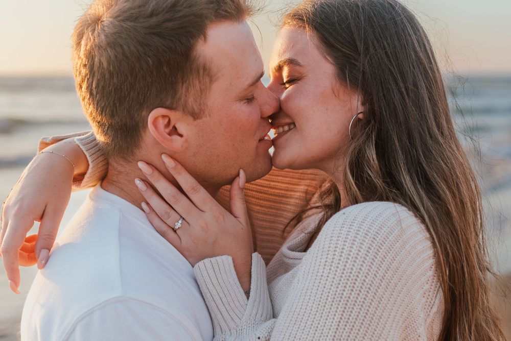 Blacks Beach couples photos with candid movement and dramatic coastal views, San Diego Engagement Photos