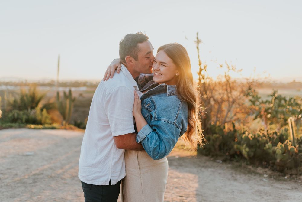 San Diego engagement photos at Balboa Park featuring candid moments and relaxed posing. Romantic and candid engagement session Balboa Park