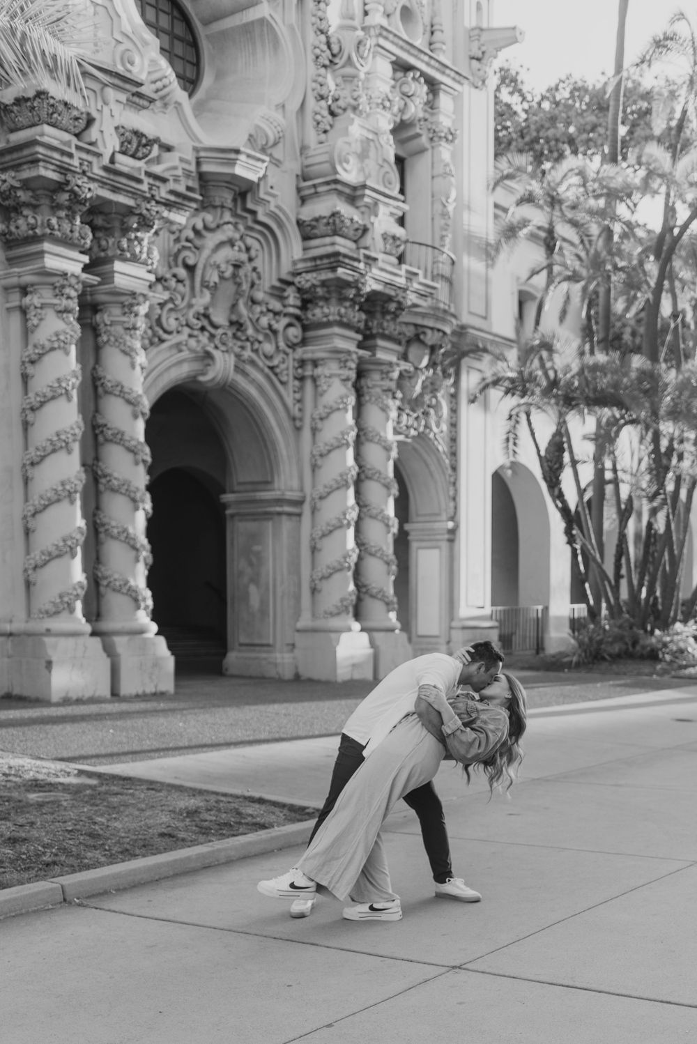 San Diego engagement photos at Balboa Park featuring candid moments and relaxed posing. Romantic and candid engagement session Balboa Park