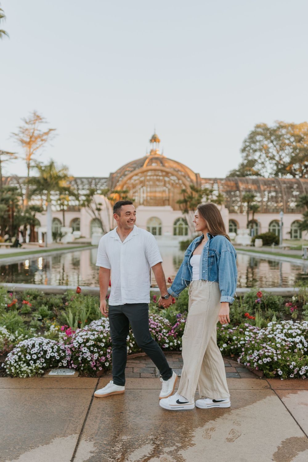 San Diego engagement photos at Balboa Park featuring candid moments and relaxed posing. Romantic and candid engagement session Balboa Park