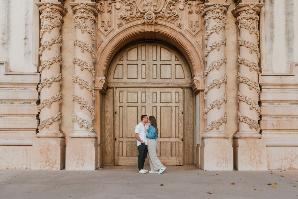 San Diego engagement photos at Balboa Park featuring candid moments and relaxed posing. Romantic and candid engagement session Balboa Park