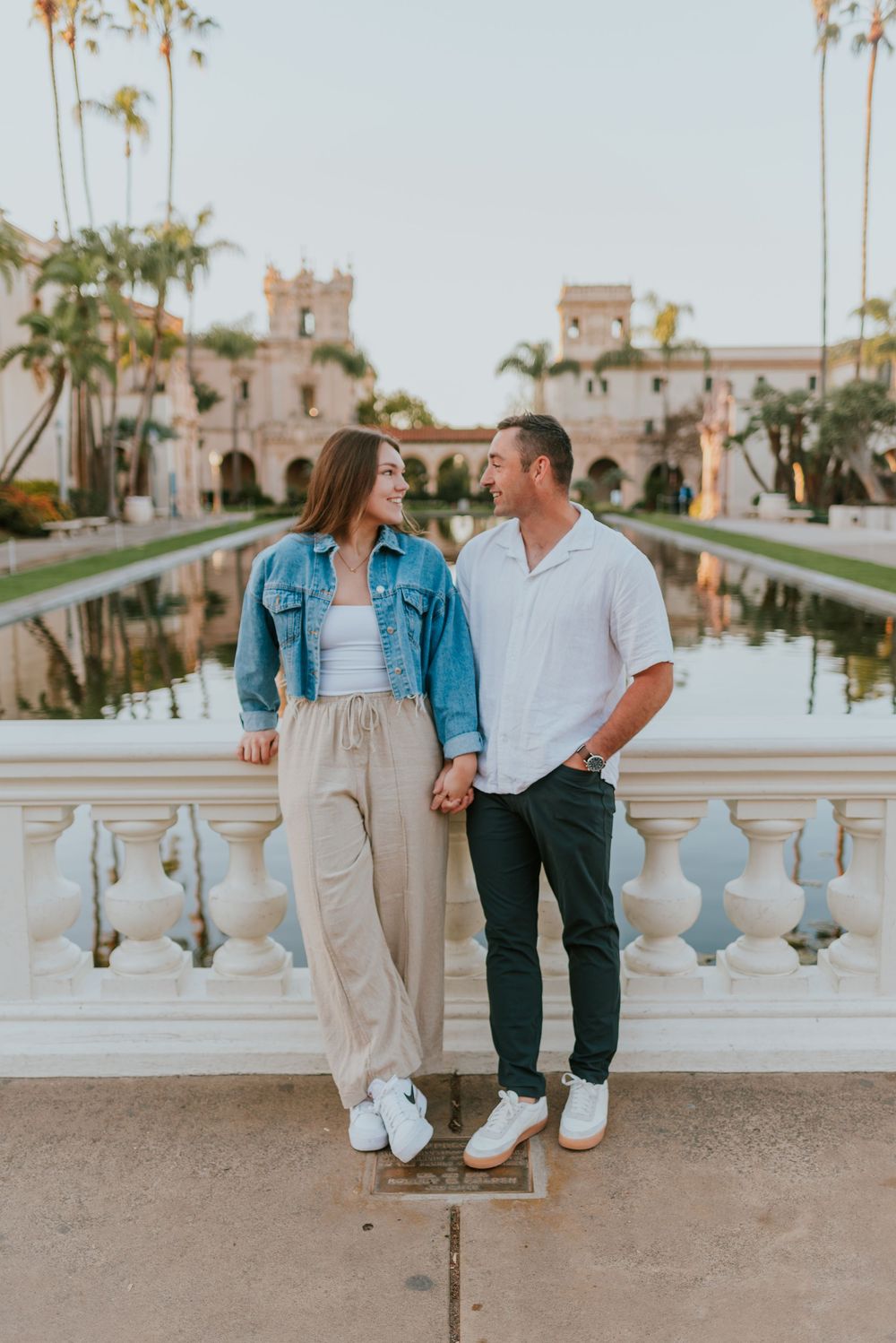 San Diego engagement photos at Balboa Park featuring candid moments and relaxed posing. Romantic and candid engagement session Balboa Park