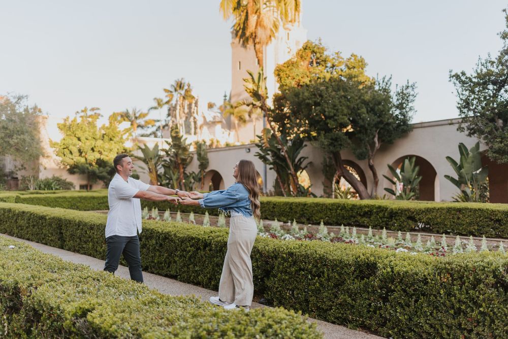 San Diego engagement photos at Balboa Park featuring candid moments and relaxed posing. Romantic and candid engagement session Balboa Park