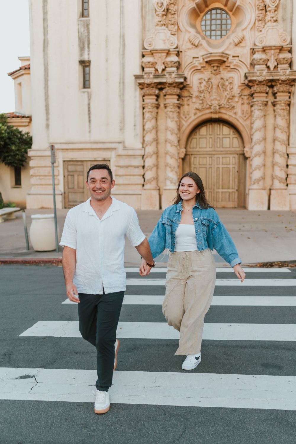 San Diego engagement photos at Balboa Park featuring candid moments and relaxed posing. Romantic and candid engagement session Balboa Park