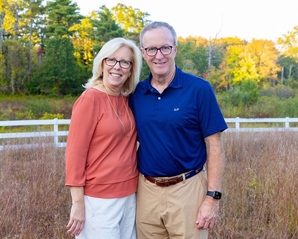 Grandparents during an extended family photoshoot in Sudbury, MA by Lisa West Photography.  Serving Metrowest of Boston area and Boston.