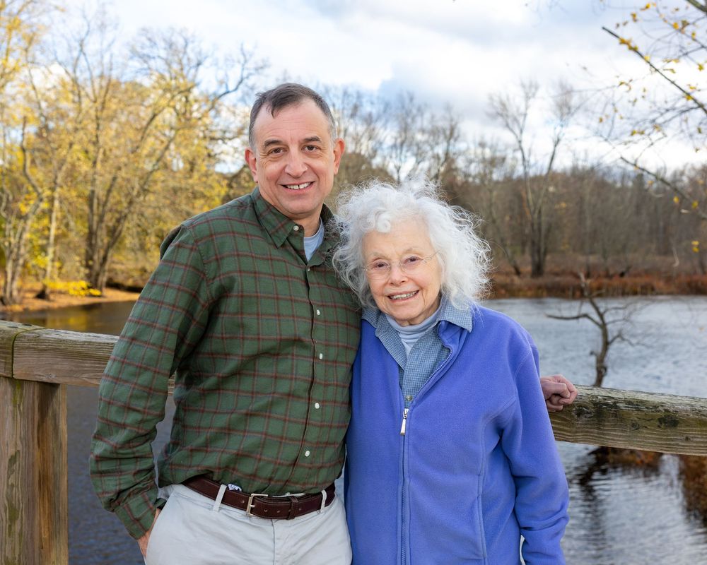 A mother and adult son during a multi-generational family photoshoot by Lisa West Photography.  Serving Sudbury Concord Boston Wayland Westo
