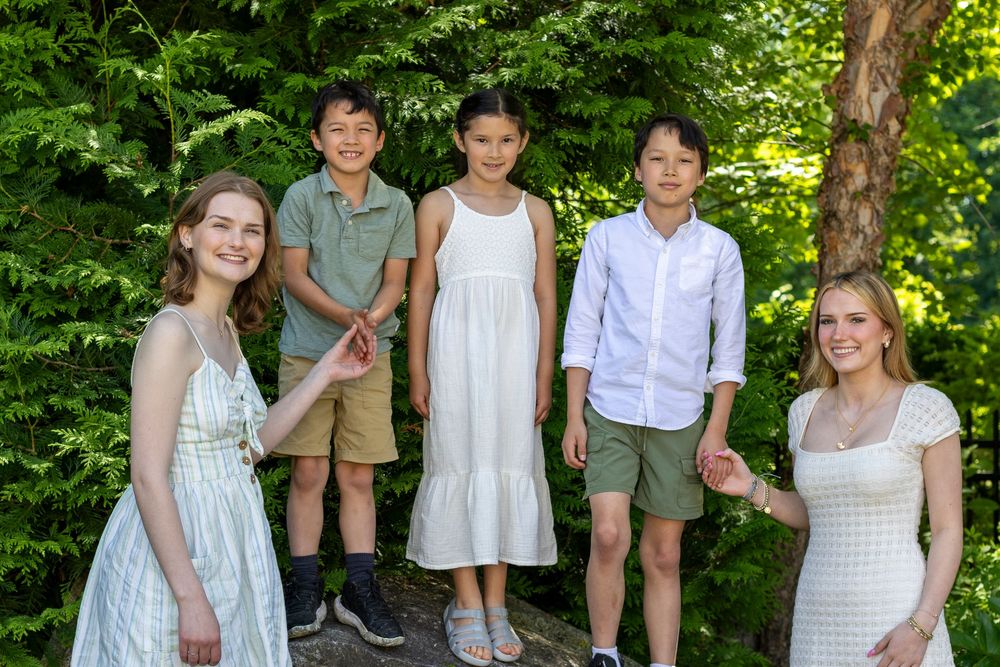 Cousins pose during an multi-generational family photo session by Lisa West Photography. Sudbury Concord Framingham Natick Wayland Weston