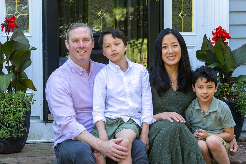 Family during an extended family photoshoot in Sudbury, MA by Lisa West Photography.  Serving Metrowest of Boston area.