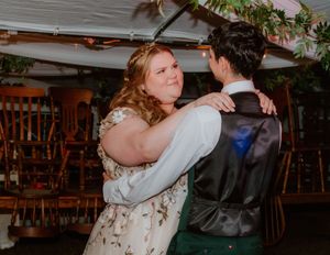 Couple shares an intimate dance moment at their wedding reception.