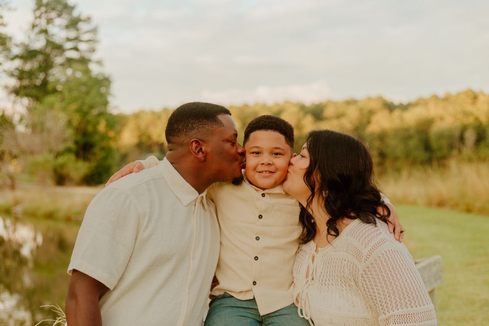 Intimate family portraits captured during golden hour by the water.