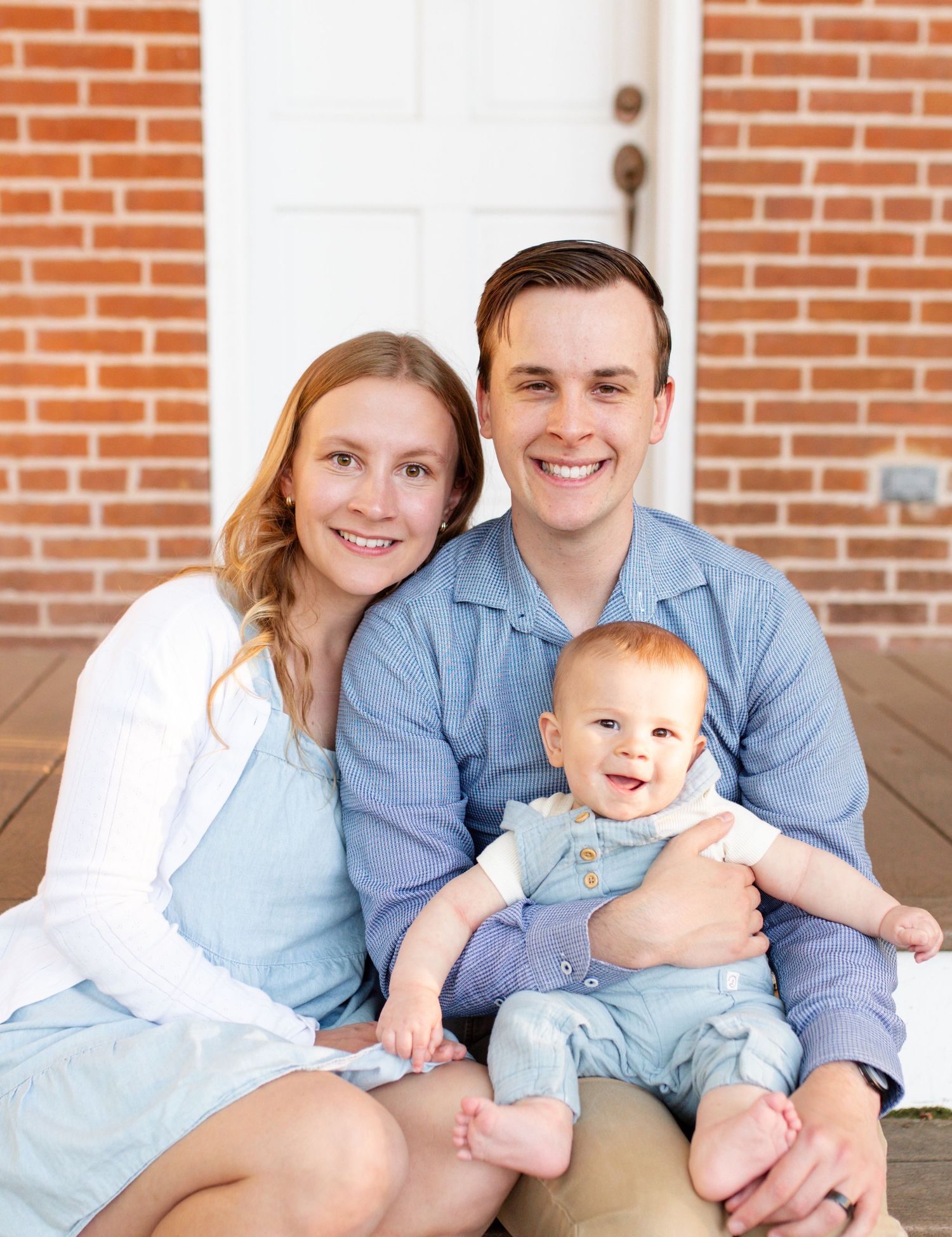 Smiling expressions during outdoor family photography session at Fort Zumwalt Park