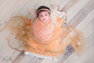 Newborn photography Melbourne, baby with tiny hands and feet close up