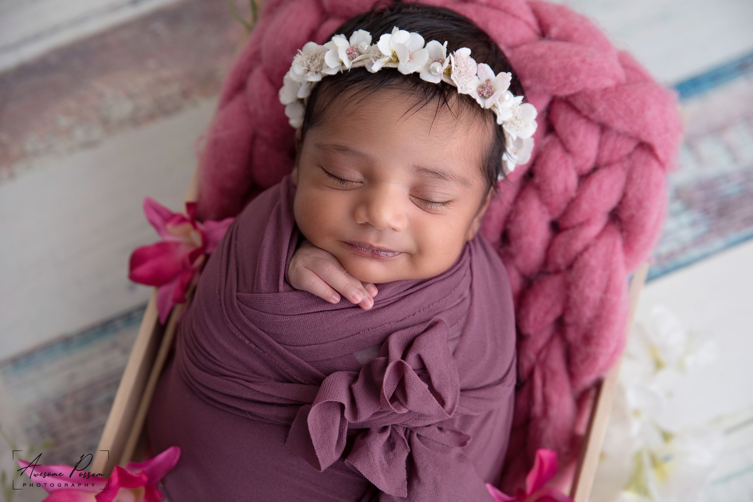 Newborn photography Melbourne, baby smiling candid studio photoshoot