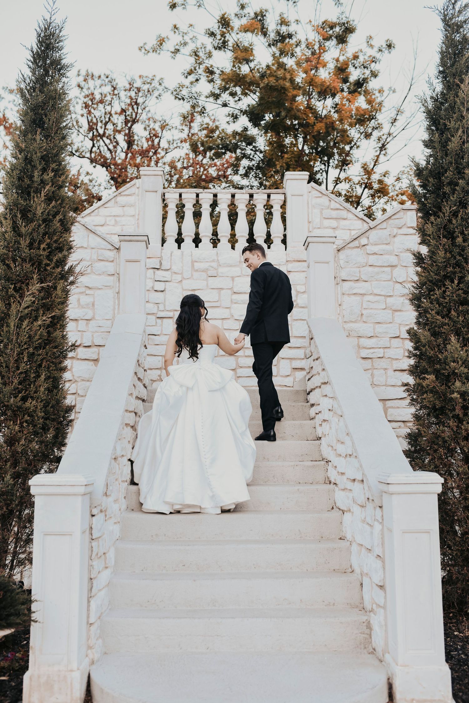 Romantic outdoor wedding portrait with dreamy golden light