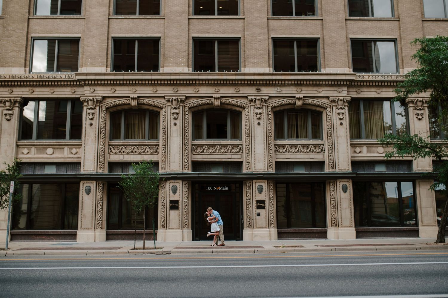 Downtown Wichita, KS engagement session by photographer Jessica Nadine Photography. Fancy classic architecture buildings city vibe