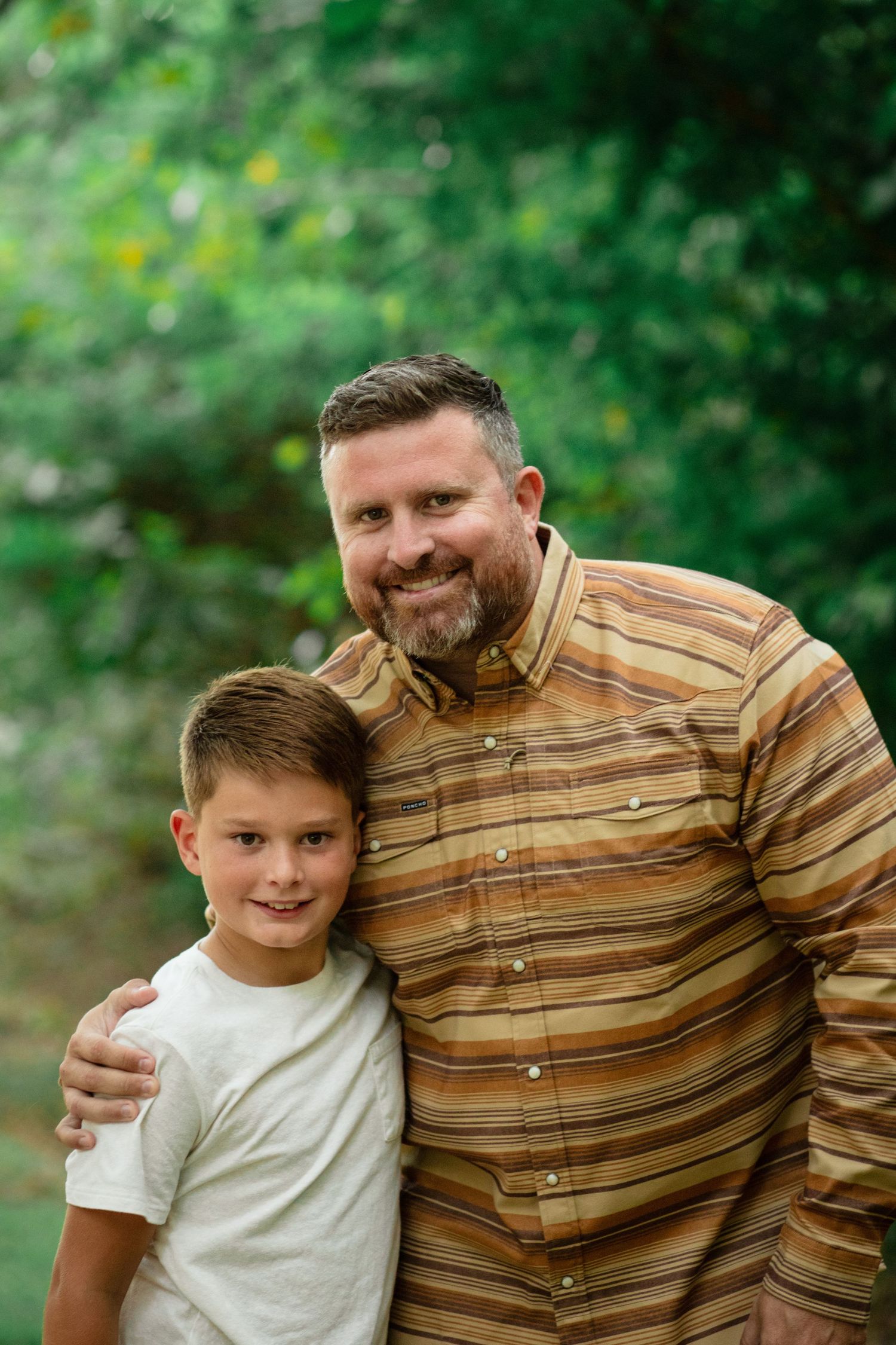 dad son photo at mills pond wells branch texas family fall mini session