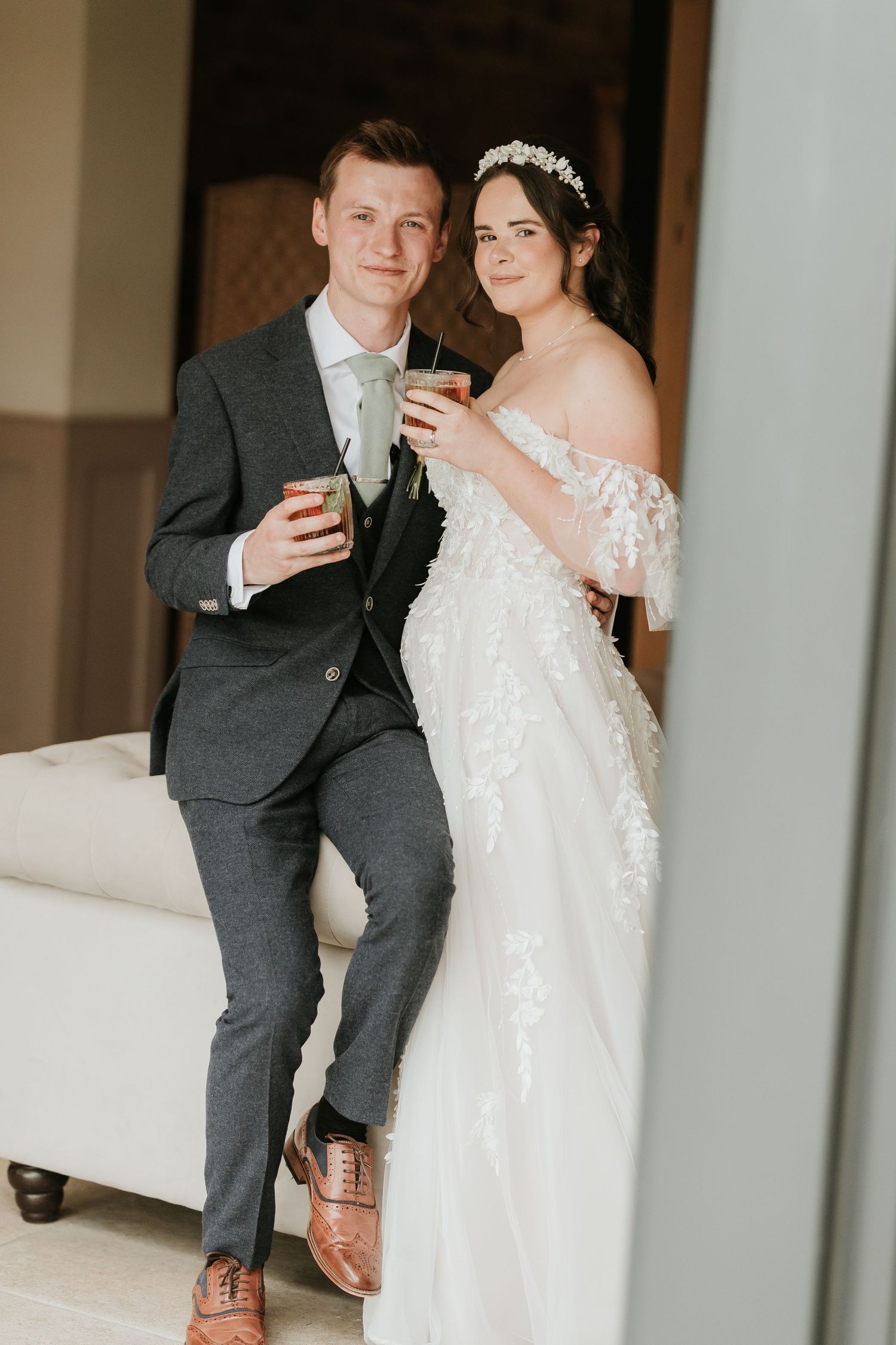 Newlywed couple in formal wedding attire sharing a drink together in three candid sequential photos.