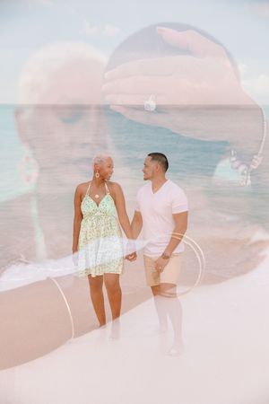 Dreamy beachside portraits of couple against soft pastel sky and ocean backdrop.