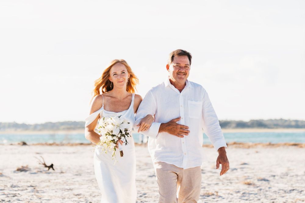 NC Coastal elopement photographer. Jacksonville Wedding Photographer and videographer. Wilmington Wedding Photographer and videographer.