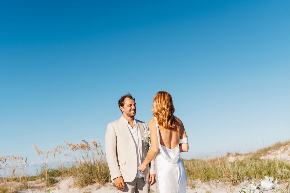 NC Coastal elopement photographer. Jacksonville Wedding Photographer and videographer. Wilmington Wedding Photographer and videographer.