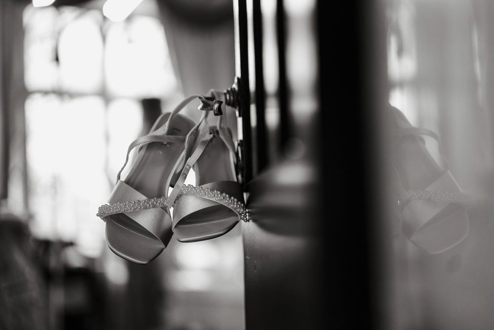 Artistic black and white photo series showing silhouetted figures against bright windows creating dramatic contrast.